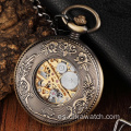 Reloj de bolsillo mecánico con esfera de números tallados en círculo de madera Vintage para hombre, cadena de reloj mecánica de bronce Steampunk hueca única
